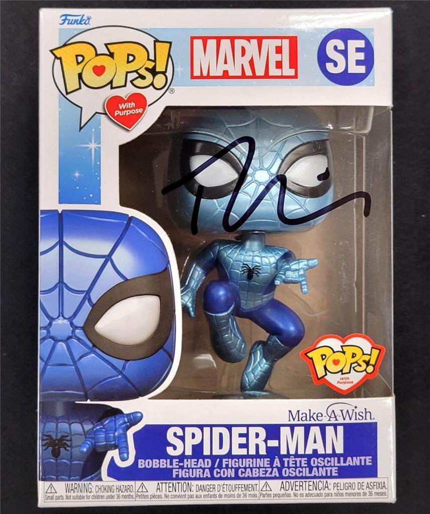 Spider-Man Funko Pop with Tobey Maguire Autograph Beckett Authenticated: Spider-Man Funko Pop with Tobey Maguire Autograph Beckett Authenticated This is an original Spider-Man Make-a-Wish Funko Pop collectible, personally signed by Tobey Maguire. The autograph is authentic