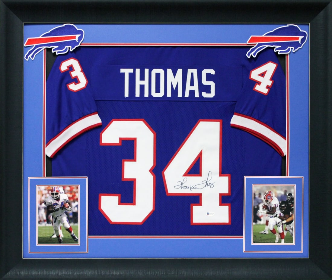Thurman Thomas Autographed Blue Framed Jersey with JSA COA: Thurman Thomas Autographed Blue Framed Jersey with JSA COA Celebrate the legacy of Thurman Thomas with this authentic signed blue pro style framed jersey. Personally signed by the Buffalo Bills legend