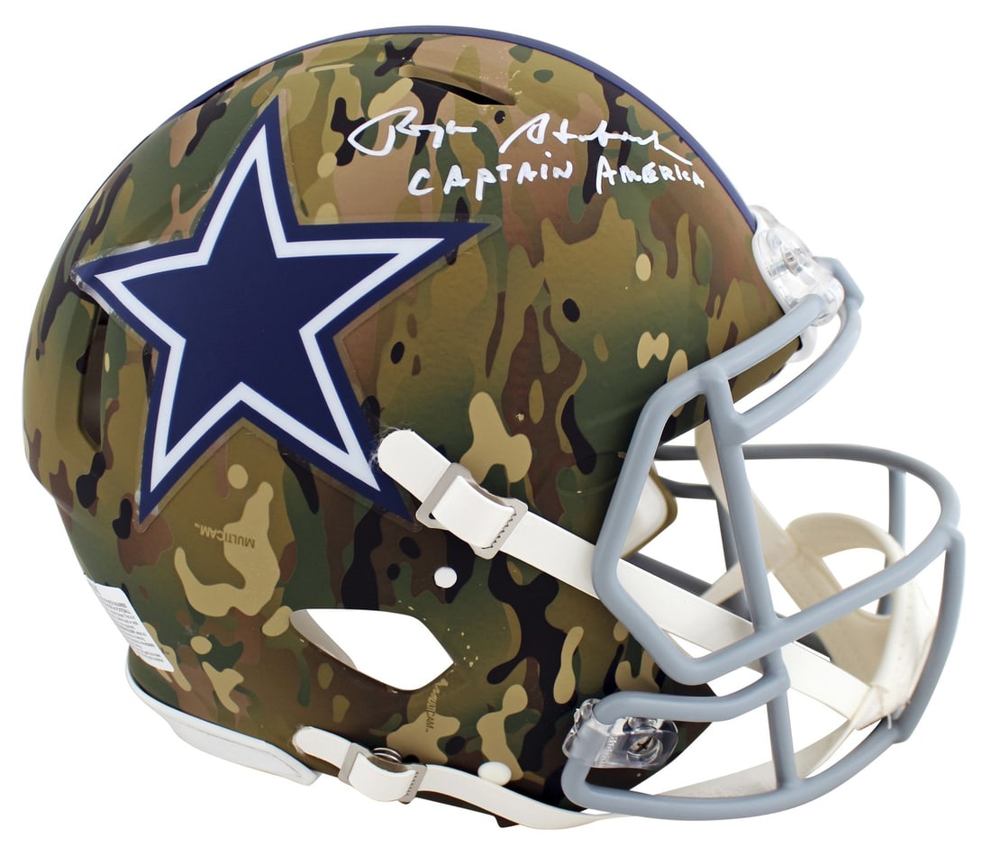 Roger Staubach Signed Camo Full Size Helmet Captain America BAS: Roger Staubach Signed Camo Full Size Helmet Captain America BAS This autographed full-size camouflage Riddell Speed Proline helmet features the iconic inscription "Captain America" and has been person
