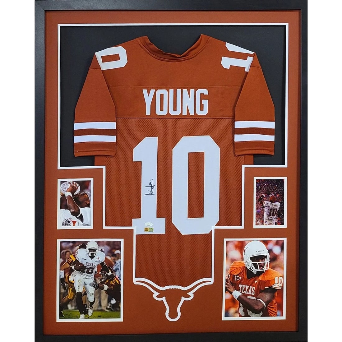 Framed Texas Longhorns Jersey Signed by Vince Young with JSA Authentication: Framed Texas Longhorns Jersey Signed by Vince Young with JSA Authentication This framed Texas Longhorns jersey is autographed by Vince Young and comes with JSA authentication, featuring a tamper-proof