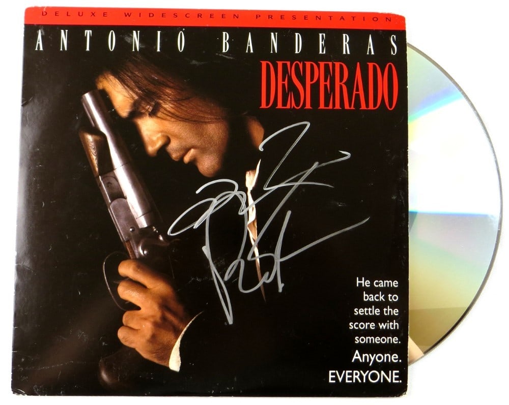 Desperado Laserdisc Cover Autographed by Tarantino Rodriguez JSA: Desperado Laserdisc Cover Autographed by Tarantino Rodriguez JSA This original DVD cover features autographs from renowned filmmakers Quentin Tarantino and Robert Rodriguez. The cover is accompanied b