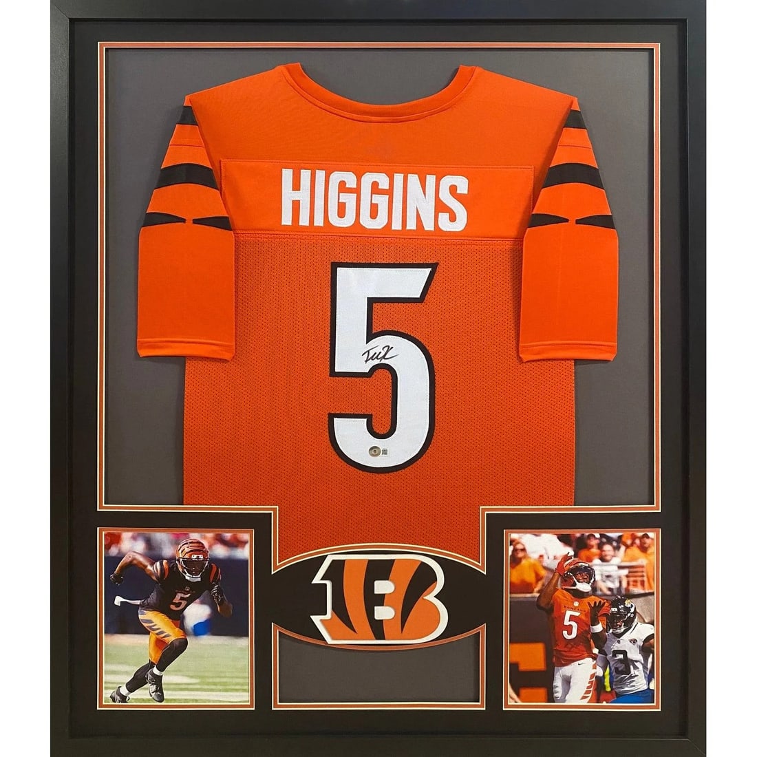 Framed Cincinnati Bengals Orange Jersey Signed by Tee Higgins Beckett Authenticated: Framed Cincinnati Bengals Orange Jersey Signed by Tee Higgins Beckett Authenticated This framed orange jersey is autographed by Tee Higgins of the Cincinnati Bengals. The jersey is authenticated by Be