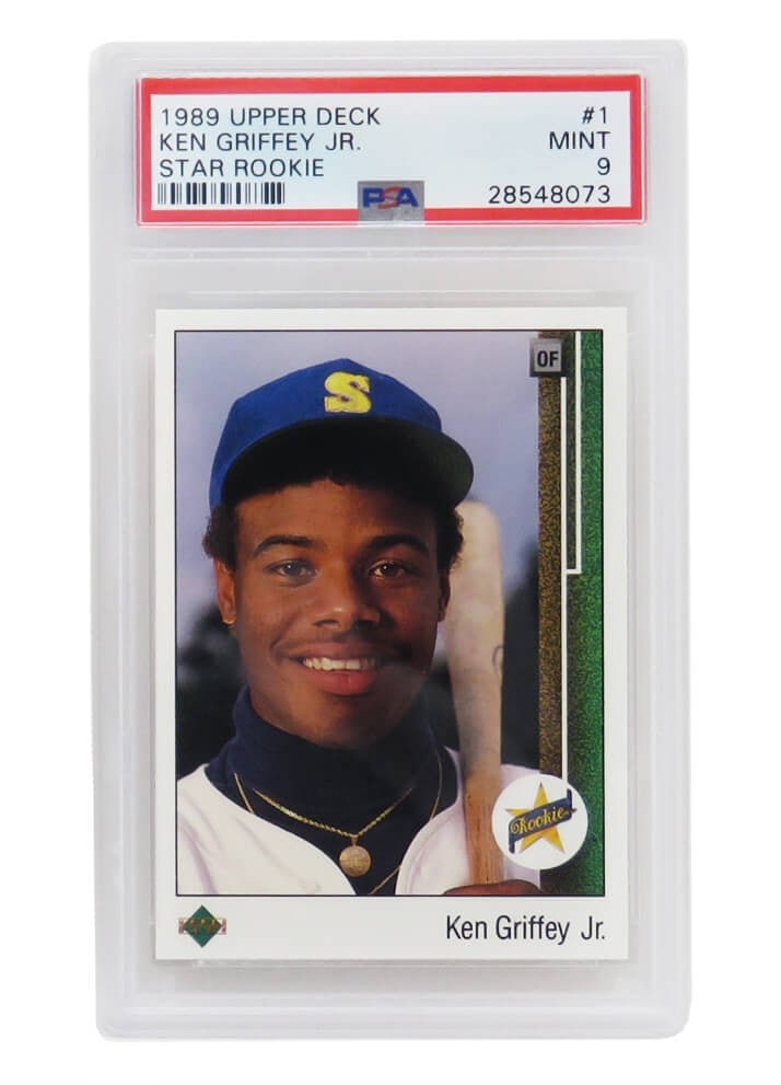 Ken Griffey Jr 1989 Upper Deck #1 Rookie Card PSA 9 Mint: Ken Griffey Jr 1989 Upper Deck #1 Rookie Card PSA 9 Mint This is a Ken Griffey Jr. 1989 Upper Deck #1 Rookie Card, encapsulated and graded Mint 9 by Professional Sports Authenticator (PSA). A must-hav