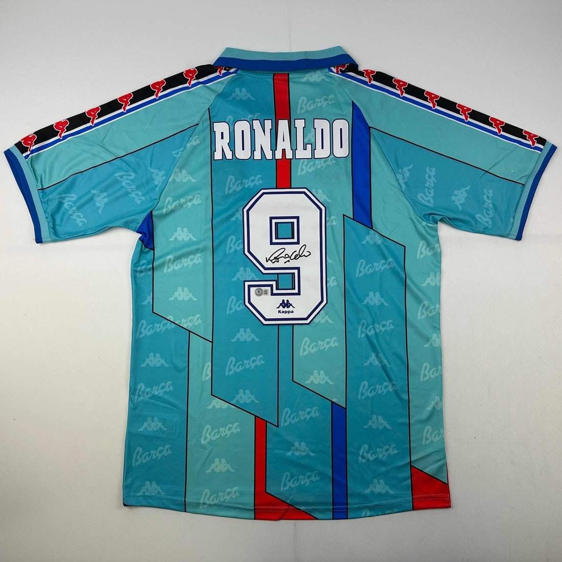 Ronaldo Nazario Signed FC Barcelona 1996-97 Teal Jersey Beckett COA: Ronaldo Nazario Signed FC Barcelona 1996-97 Teal Jersey Beckett COA This is an authentic autographed teal jersey of Ronaldo Nazario from the 1996-97 season with FC Barcelona. The jersey comes with thi