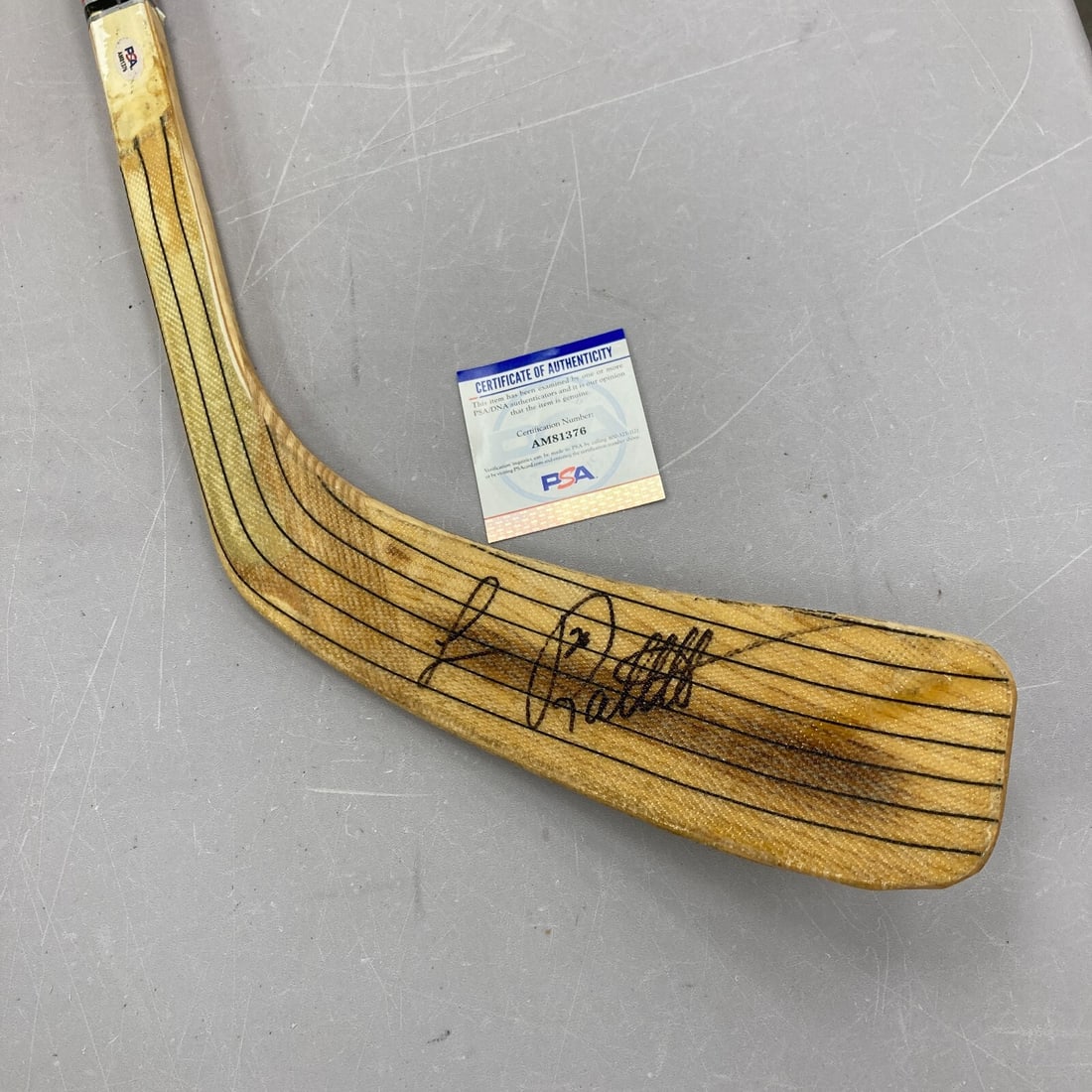 Luc Robitaille Autographed Game Used Sher-Wood Hockey Stick PSA/DNA COA: Luc Robitaille Autographed Game Used Sher-Wood Hockey Stick PSA/DNA COA This is a game-used and autographed hockey stick from legendary player Luc Robitaille, known for his impressive scoring ability.