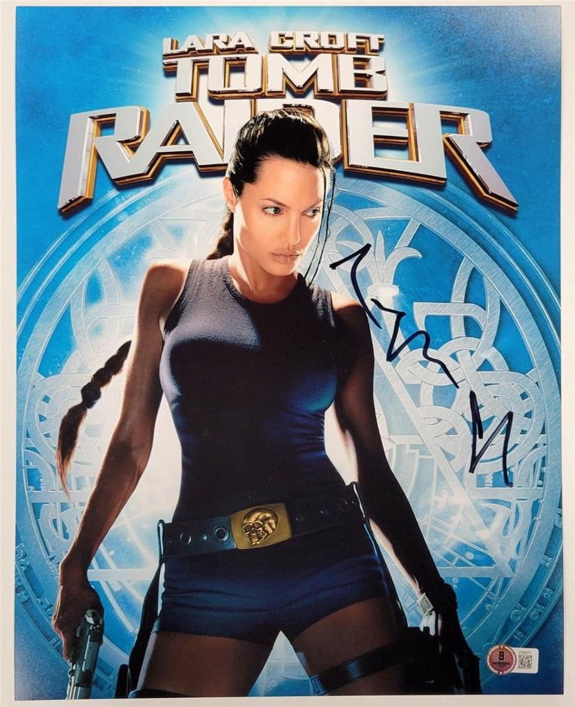 11x14 Angelina Jolie Autographed Photograph Lara Croft Beckett Authenticated: 11x14 Angelina Jolie Autographed Photograph Lara Croft Beckett Authenticated This is an original 11x14 photograph signed by Angelina Jolie as Lara Croft from Tomb Raider. The autograph is authenticate