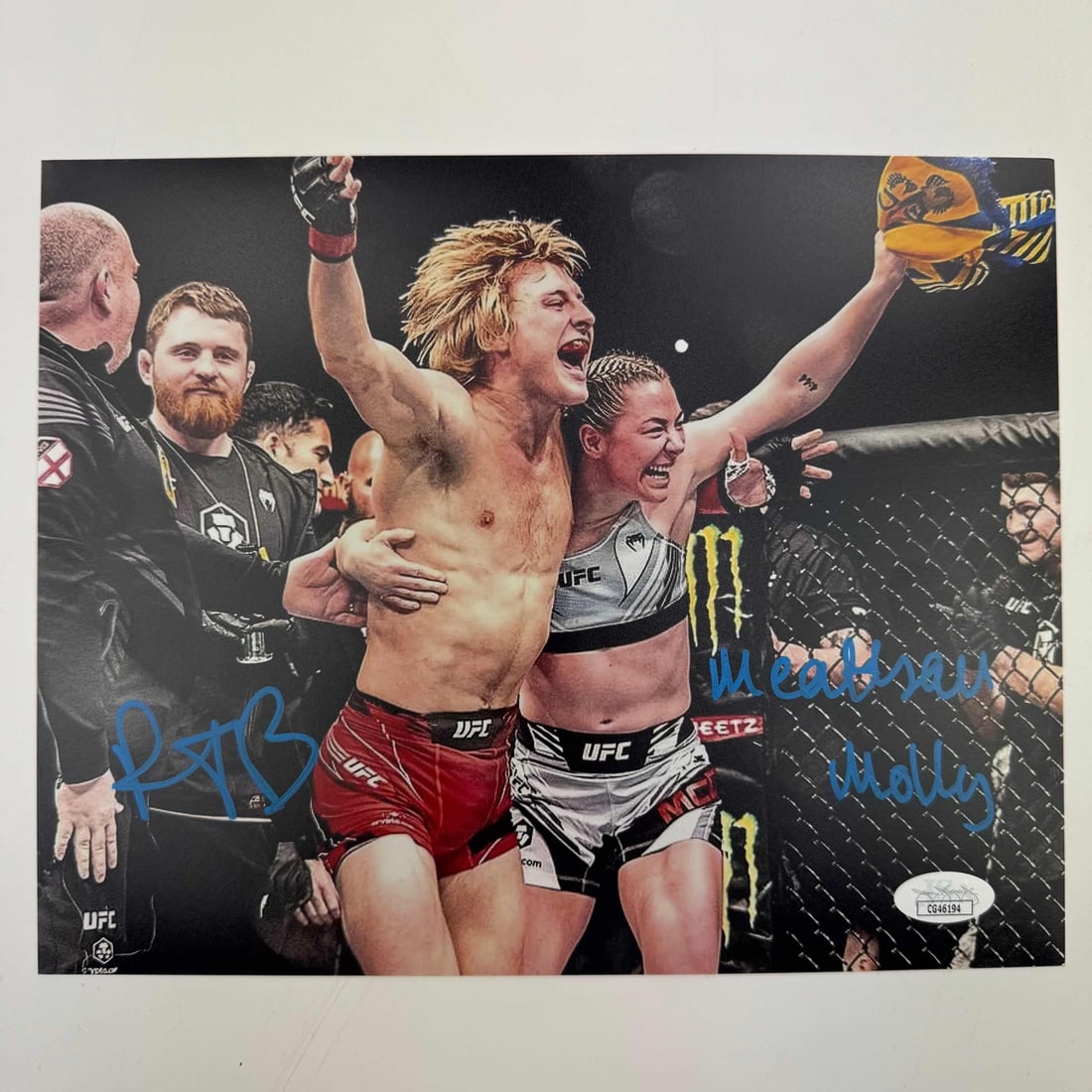 Paddy Pimblett Molly McCann Dual Autographed 8x10 Photo JSA COA UFC: Paddy Pimblett Molly McCann Dual Autographed 8x10 Photo JSA COA UFC This stunning dual 8x10 photo features the autographs of UFC athletes Paddy Pimblett and Molly McCann. The item is authenticated by 