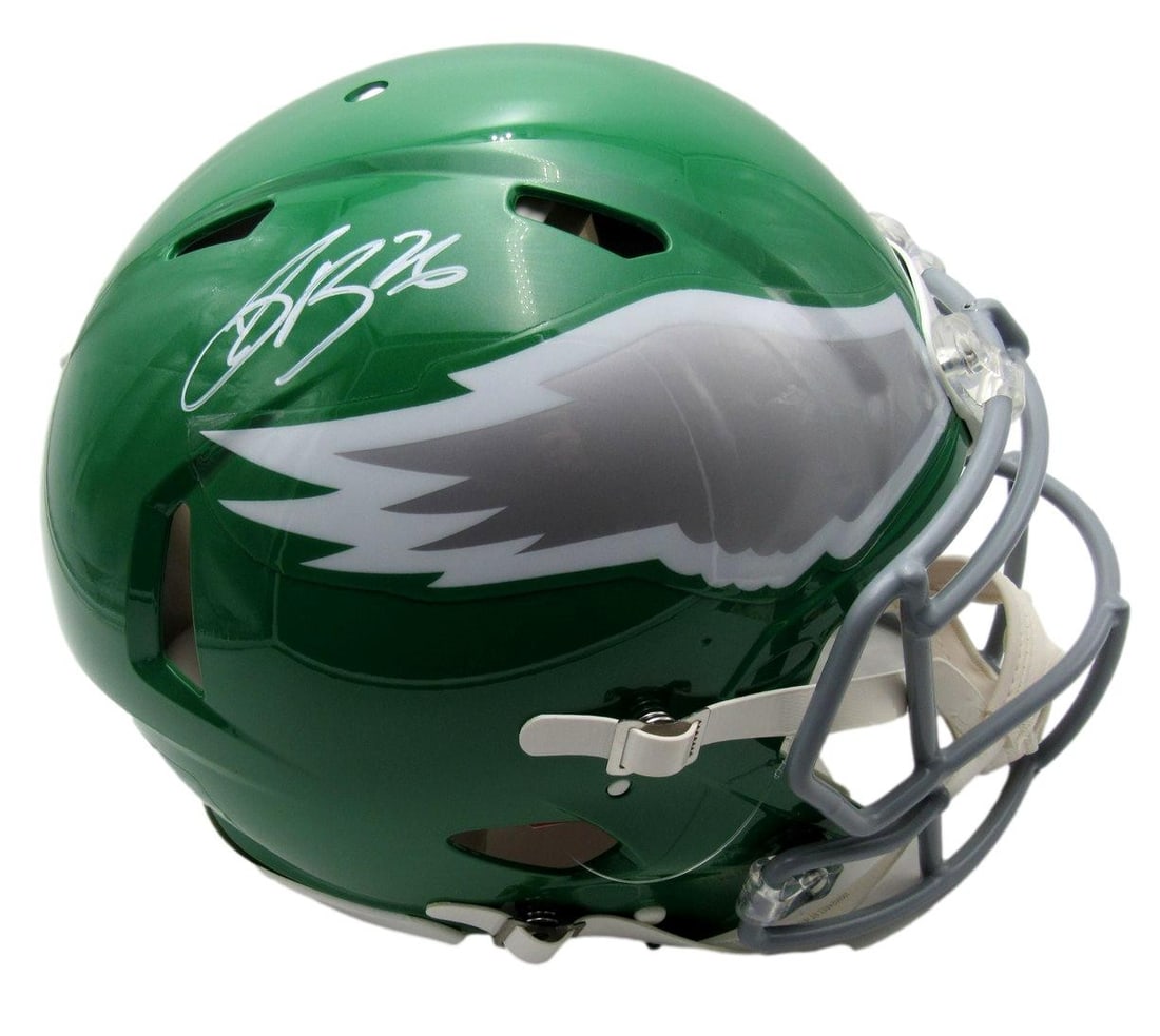 Saquon Barkley Autographed Kelly-green Full Size Helmet Eagles PSA Authenticated: Saquon Barkley Autographed Kelly-green Full Size Helmet Eagles PSA Authenticated This is a full-size authentic Kelly-green football helmet signed by Saquon Barkley, showcasing his autograph prominentl