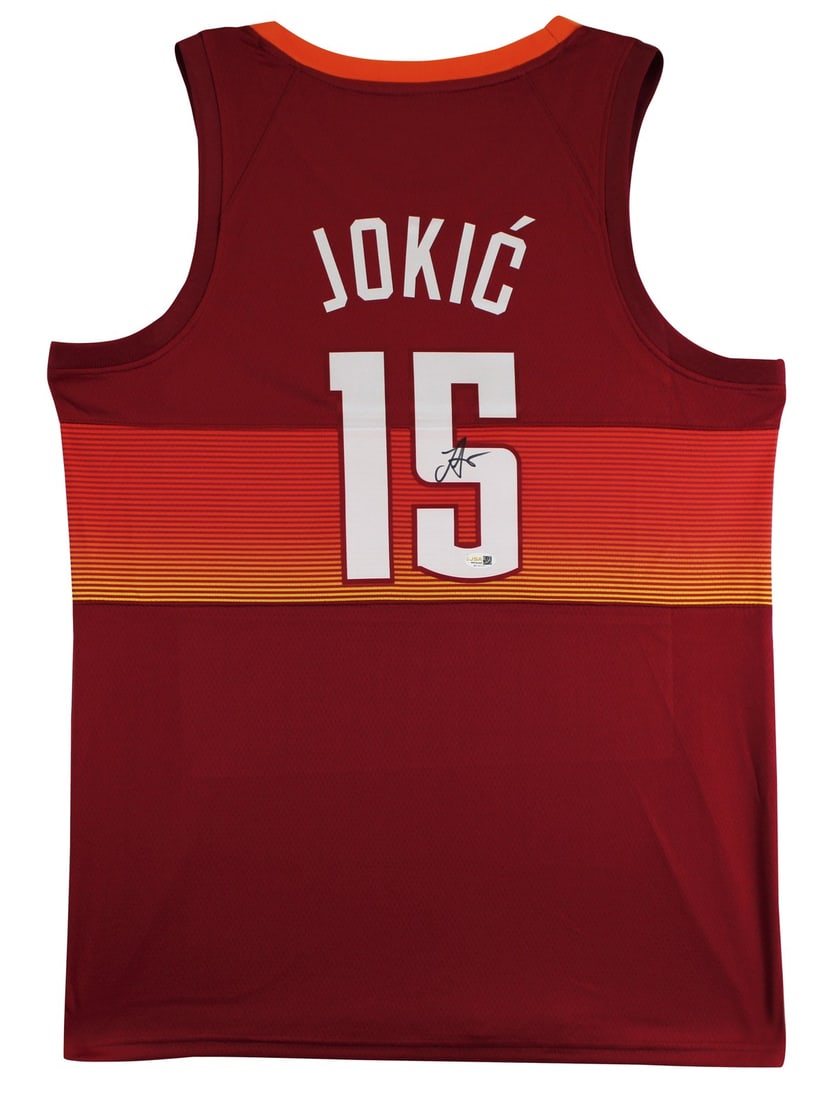 Red City Edition Jersey Signed by Nikola Jokic with JSA Authentication: Red City Edition Jersey Signed by Nikola Jokic with JSA Authentication This is a pre-owned, authentic Nikola Jokic autographed Red City Edition Pro Style Jersey, featuring pressed numbering and letter