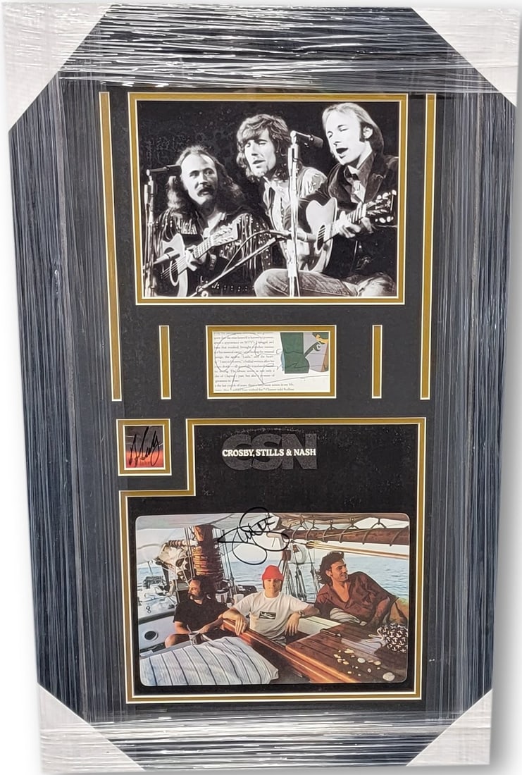 David Crosby Stephen Stills Graham Nash Signed Photo Custom Frame GAI Authenticated: David Crosby Stephen Stills Graham Nash Signed Photo Custom Frame GAI Authenticated This stunning custom framed piece features a hand-signed photo of music legends David Crosby, Stephen Stills, and Gr