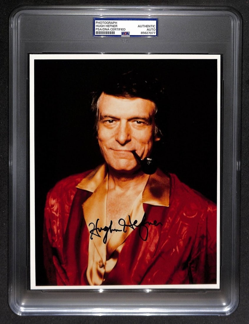 8x10 Hugh Hefner Playboy Photo Signed with PSA DNA and Beckett Authentication: 8x10 Hugh Hefner Playboy Photo Signed with PSA DNA and Beckett Authentication This is an original 8x10 photo featuring Hugh Hefner, signed and autographed. The item has been authenticated by both PSA/
