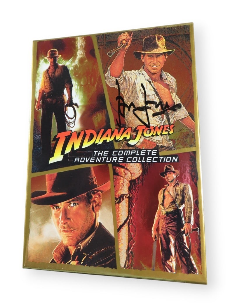 Harrison Ford Autographed Indiana Jones DVD Cover Beckett Authenticated: Harrison Ford Autographed Indiana Jones DVD Cover Beckett Authenticated This is an original DVD cover from the Indiana Jones Collection, signed by the iconic actor Harrison Ford. The autograph has bee