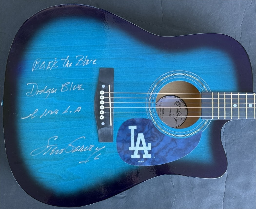 Steve Garvey Autographed Dodgers Guitar Back The Blue JSA Authenticated: Steve Garvey Autographed Dodgers Guitar Back The Blue JSA Authenticated This is an authentic guitar signed by baseball legend Steve Garvey, featuring a Dodgers-themed design with the phrase "Back The 
