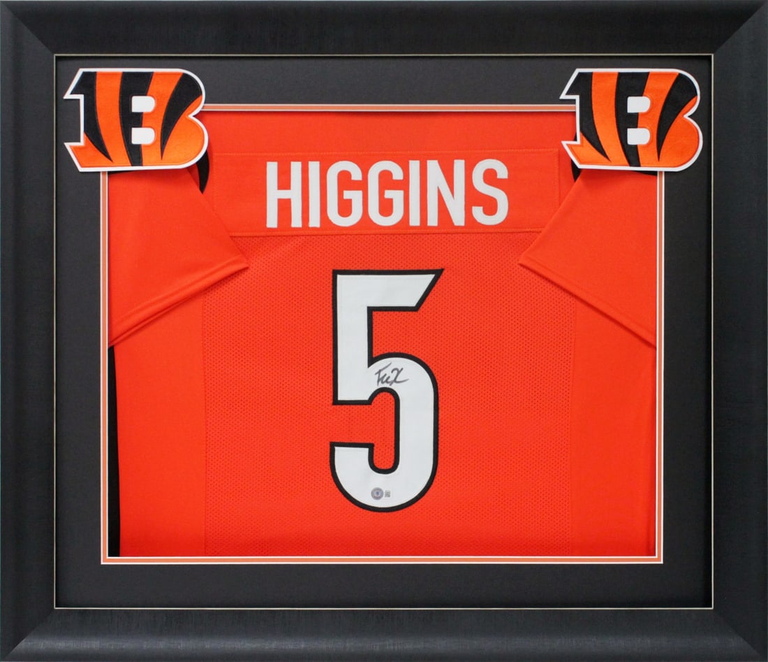 Tee Higgins Signed Orange Pro Style Framed Jersey BAS Authenticated 32 x 37: Tee Higgins Signed Orange Pro Style Framed Jersey BAS Authenticated 32 x 37 This authentic orange pro style framed jersey has been personally signed by Tee Higgins of the Cincinnati Bengals. It featur
