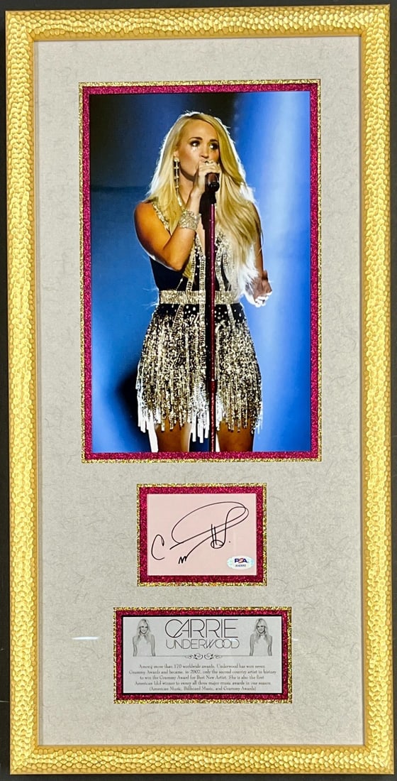 Carrie Underwood Signed Cut Framed Display PSA/DNA Authenticated 27x14: Carrie Underwood Signed Cut Framed Display PSA/DNA Authenticated 27x14 This stunning custom framed display features a signed cut from music icon Carrie Underwood, authenticated by PSA/DNA. The piece m
