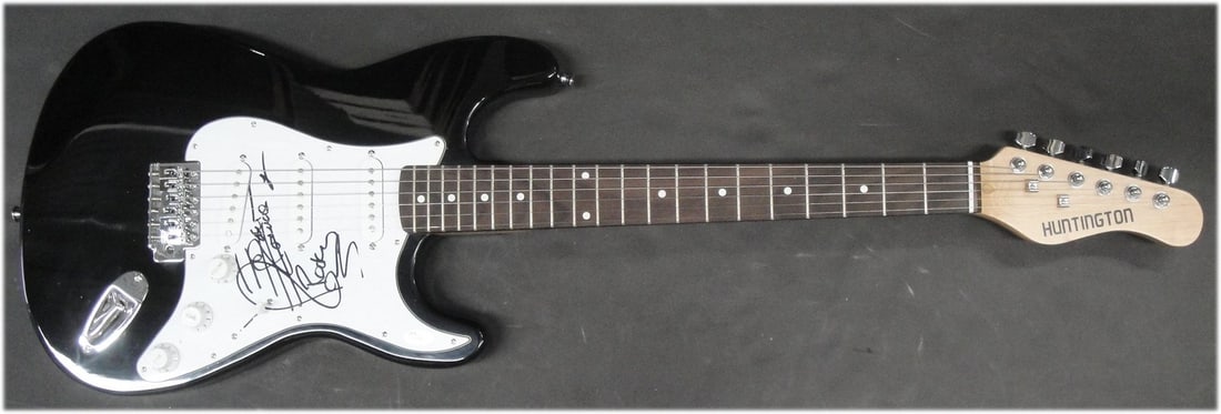 Carol Connors Autographed Electric Guitar Rocky Theme JSA Certified: Carol Connors Autographed Electric Guitar Rocky Theme JSA Certified This electric guitar is hand-signed by Carol Connors, known for her iconic contributions to the Rocky theme. The autograph has been 