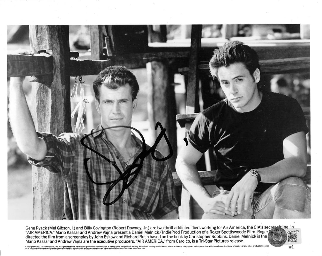 Robert Downey Jr. Air America Signed 8x10 Photo with Beckett COA: Robert Downey Jr. Air America Signed 8x10 Photo with Beckett COA This authentic signed 8x10 black and white photograph features Robert Downey Jr., known for his role in Air America. The photograph sho