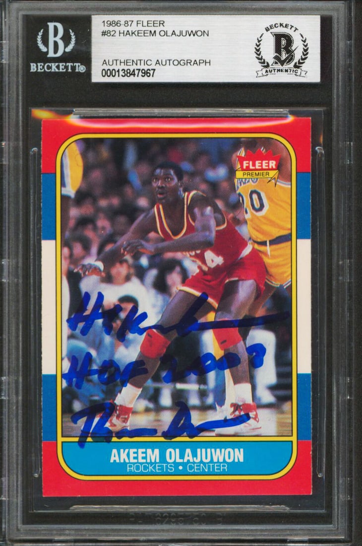 Hakeem Olajuwon Signed 1986 Fleer Rookie Card with HOF Inscription BAS Authenticated (1 of 2)