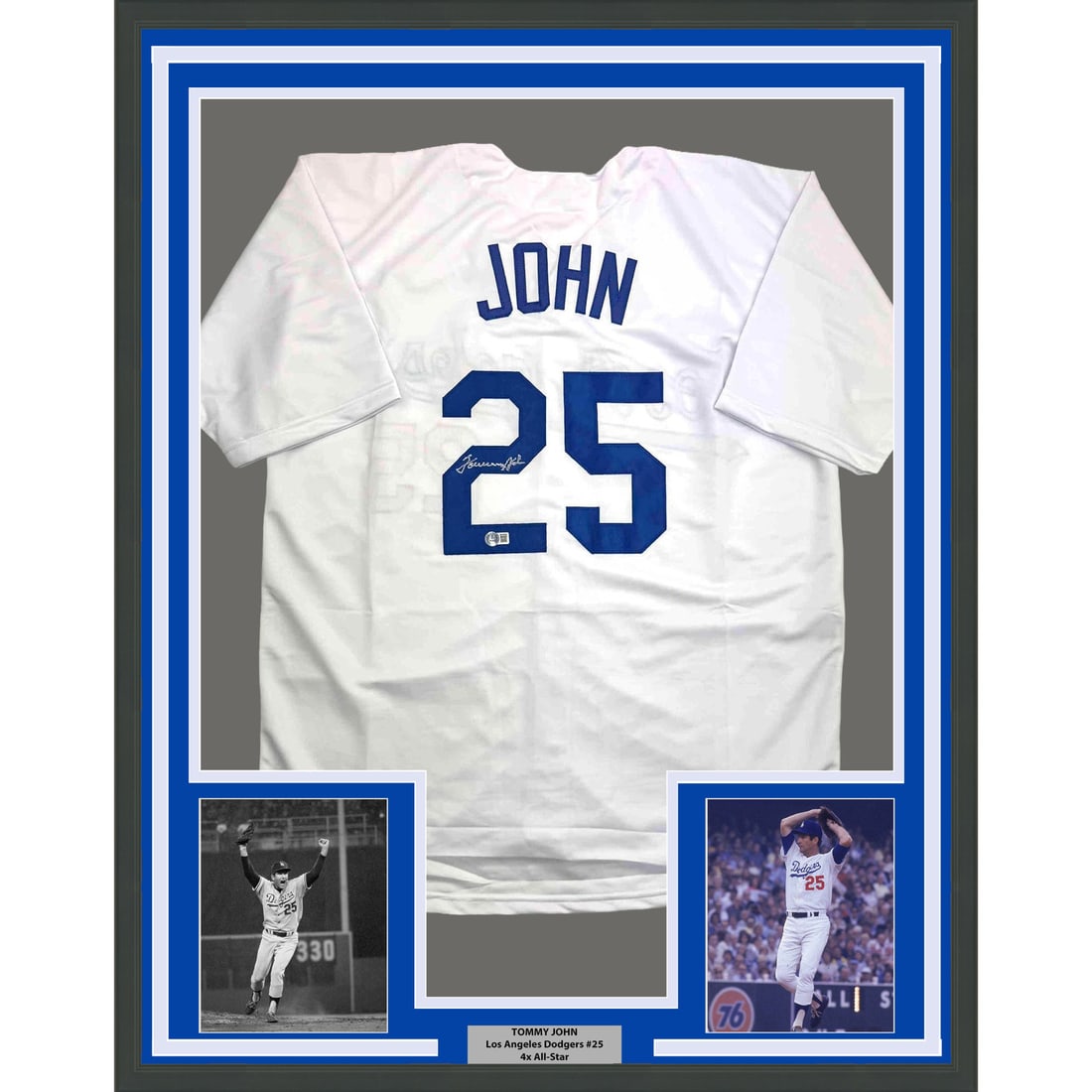 Tommy John signed framed Dodgers jersey 35x39 with two 5x7 photos: Tommy John signed framed Dodgers jersey 35x39 with two 5x7 photos This framed Los Angeles Dodgers white jersey is autographed by Tommy John and comes with Beckett Certificate of Authenticity. The jers