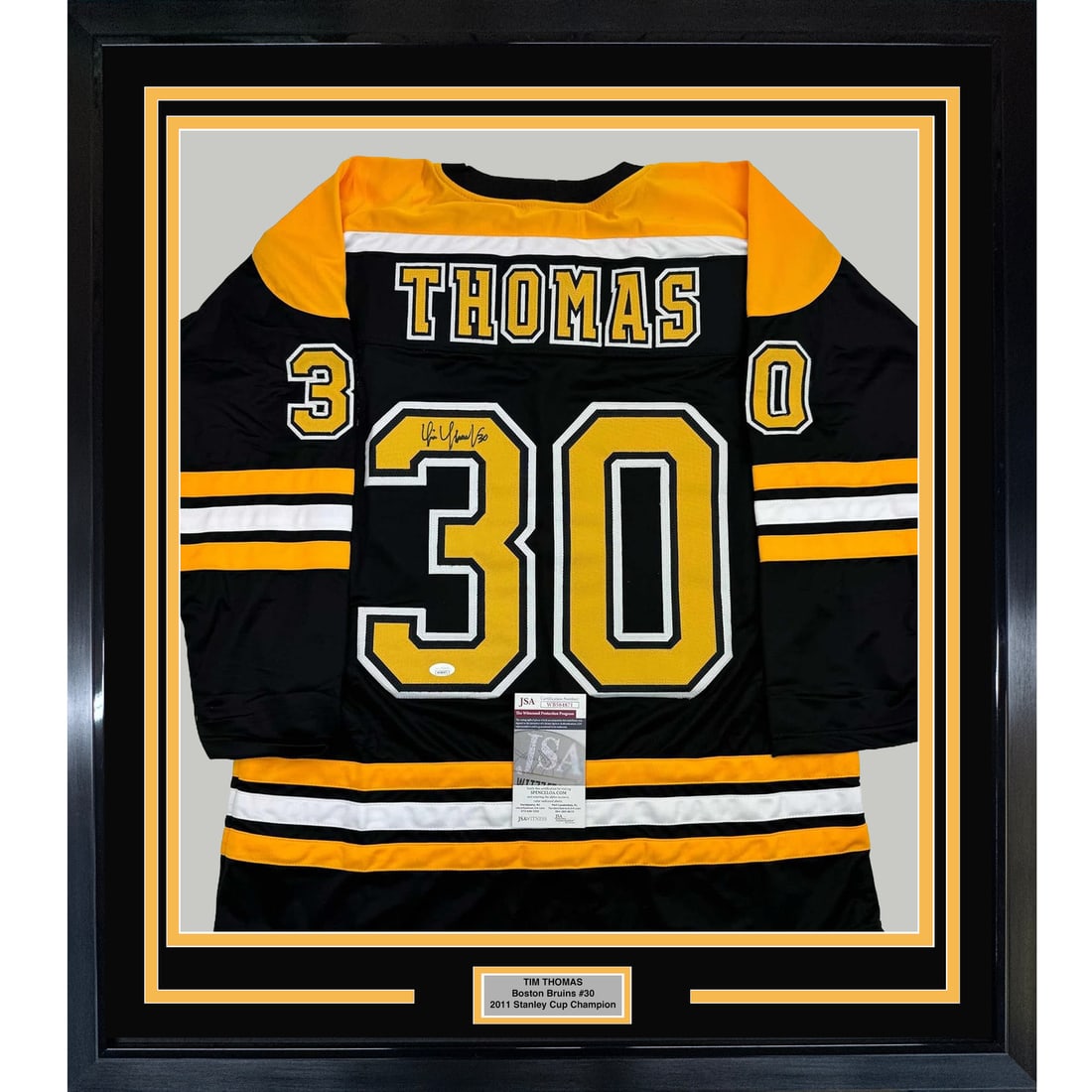 Framed Tim Thomas Signed Boston Bruins Jersey with JSA Authentication: Framed Tim Thomas Signed Boston Bruins Jersey with JSA Authentication This professionally framed and matted Boston Bruins hockey jersey features the autograph of Tim Thomas, a celebrated NHL player. M