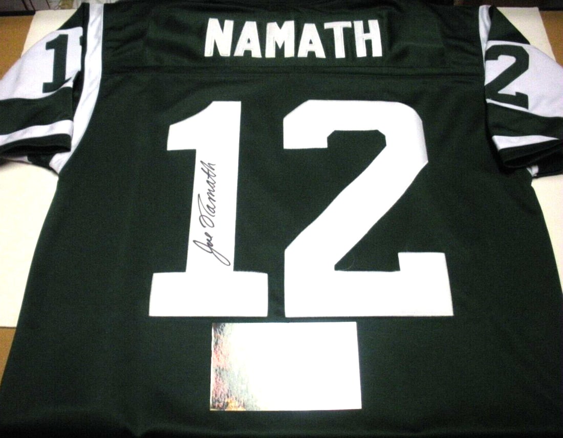 Mitchell & Ness Joe Namath Signed New York Jets Jersey With GAI COA: Mitchell & Ness Joe Namath Signed New York Jets Jersey With GAI COA This is an official licensed Mitchell & Ness New York Jets jersey signed by Joe Namath. The jersey is an original item and comes wit