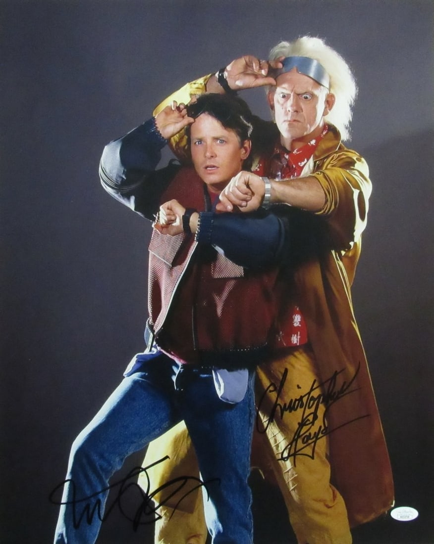 Michael J Fox Christopher Lloyd Signed 16x20 Photo Back to the Future JSA: Michael J Fox Christopher Lloyd Signed 16x20 Photo Back to the Future JSA This is an original 16x20 autographed photo featuring Michael J. Fox and Christopher Lloyd from the iconic film "Back to the F