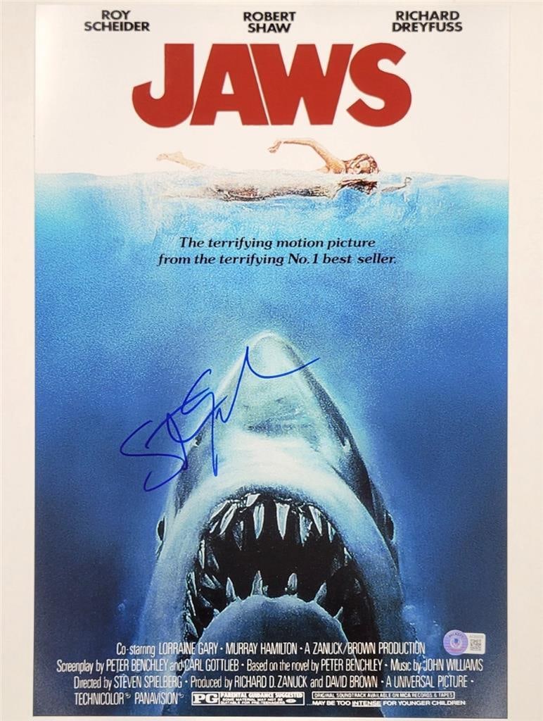 Steven Spielberg Signed Jaws 12x18 Photo Poster Beckett Authenticated: Steven Spielberg Signed Jaws 12x18 Photo Poster Beckett Authenticated This 12x18 photograph poster from the classic movie Jaws is authentically signed by legendary director Steven Spielberg. It comes 