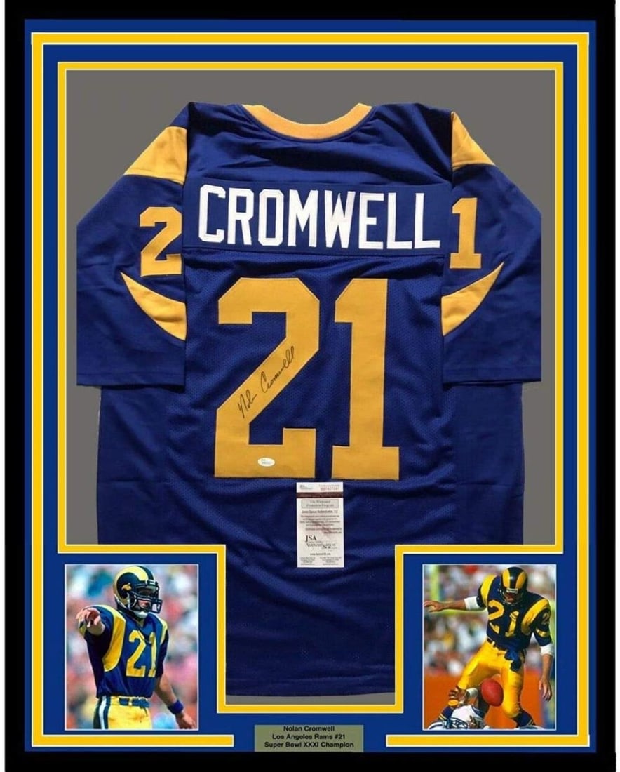 Framed Signed Nolan Cromwell Los Angeles Rams Jersey with JSA COA: Framed Signed Nolan Cromwell Los Angeles Rams Jersey with JSA COA This professionally framed and matted item features a signed Nolan Cromwell Los Angeles Rams jersey, measuring 33x42 inches. The displ