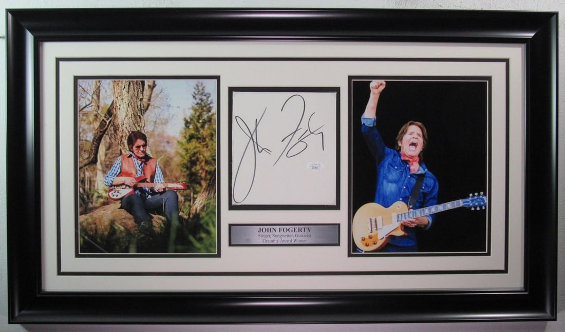 John Fogarty Autographed Cut Card with Photo Collage Framed JSA Certified: John Fogarty Autographed Cut Card with Photo Collage Framed JSA Certified This framed cut card features the autograph of John Fogarty, the renowned singer known for his work with Creedence Clearwater 