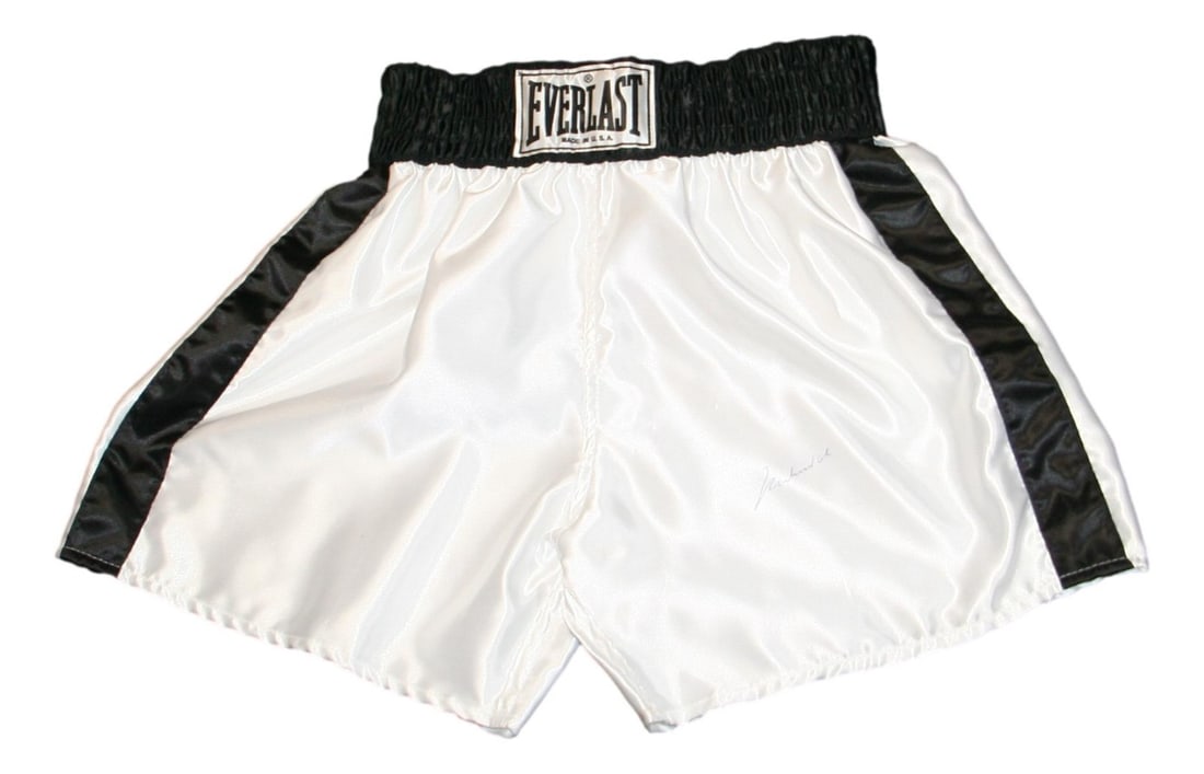 Boxing Trunks Signed by Muhammad Ali With PSA Authentication: Boxing Trunks Signed by Muhammad Ali With PSA Authentication This is a pair of boxing trunks autographed by Muhammad Ali. The signature has been authenticated by Professional Sports Authenticator (PSA