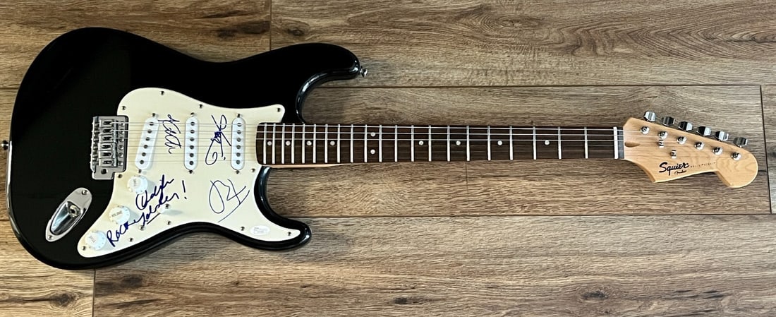 The B-52's Signed Fender Squire Guitar with Rock Lobster JSA Authenticated: The B-52's Signed Fender Squire Guitar with Rock Lobster JSA Authenticated This stunning Fender Squire guitar is a collector's dream, featuring the signatures of all four original members of the iconi