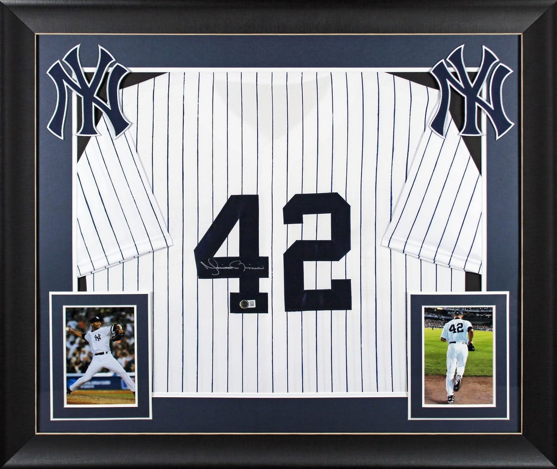 Mariano Rivera Signed Framed White Pinstripe Jersey New York Yankees BAS Authenticated: Mariano Rivera Signed Framed White Pinstripe Jersey New York Yankees BAS Authenticated Celebrate the legacy of Mariano Rivera with this authentic autographed white pinstripe pro style framed jersey. P