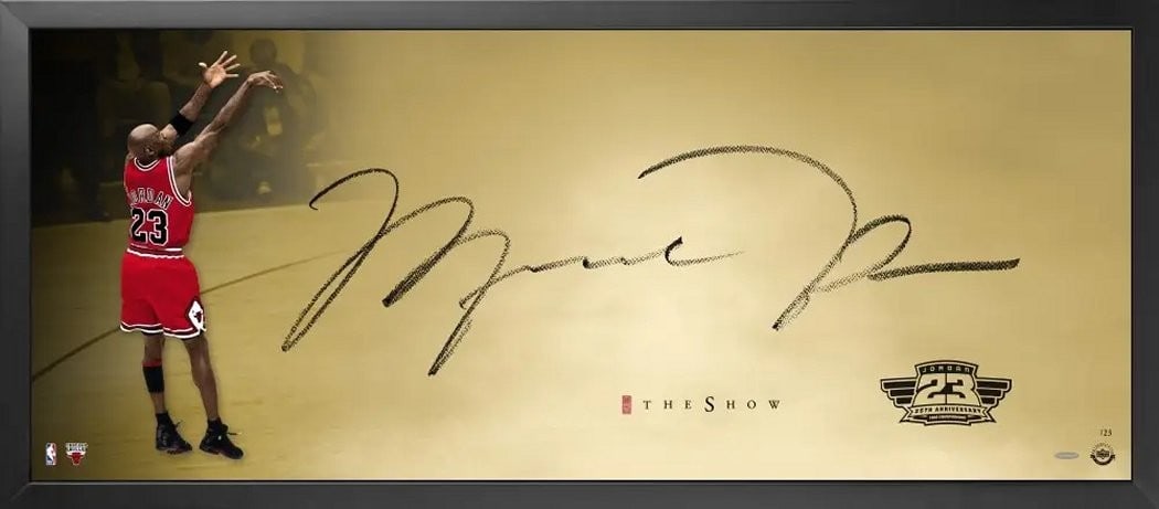 Michael Jordan Autographed Last Shot Print Framed Gold Limited Edition #/23: Michael Jordan Autographed Last Shot Print Framed Gold Limited Edition #/23 This stunning framed print measures 18 x 44 inches and captures the iconic moment known as 'The Last Shot,' famously execute