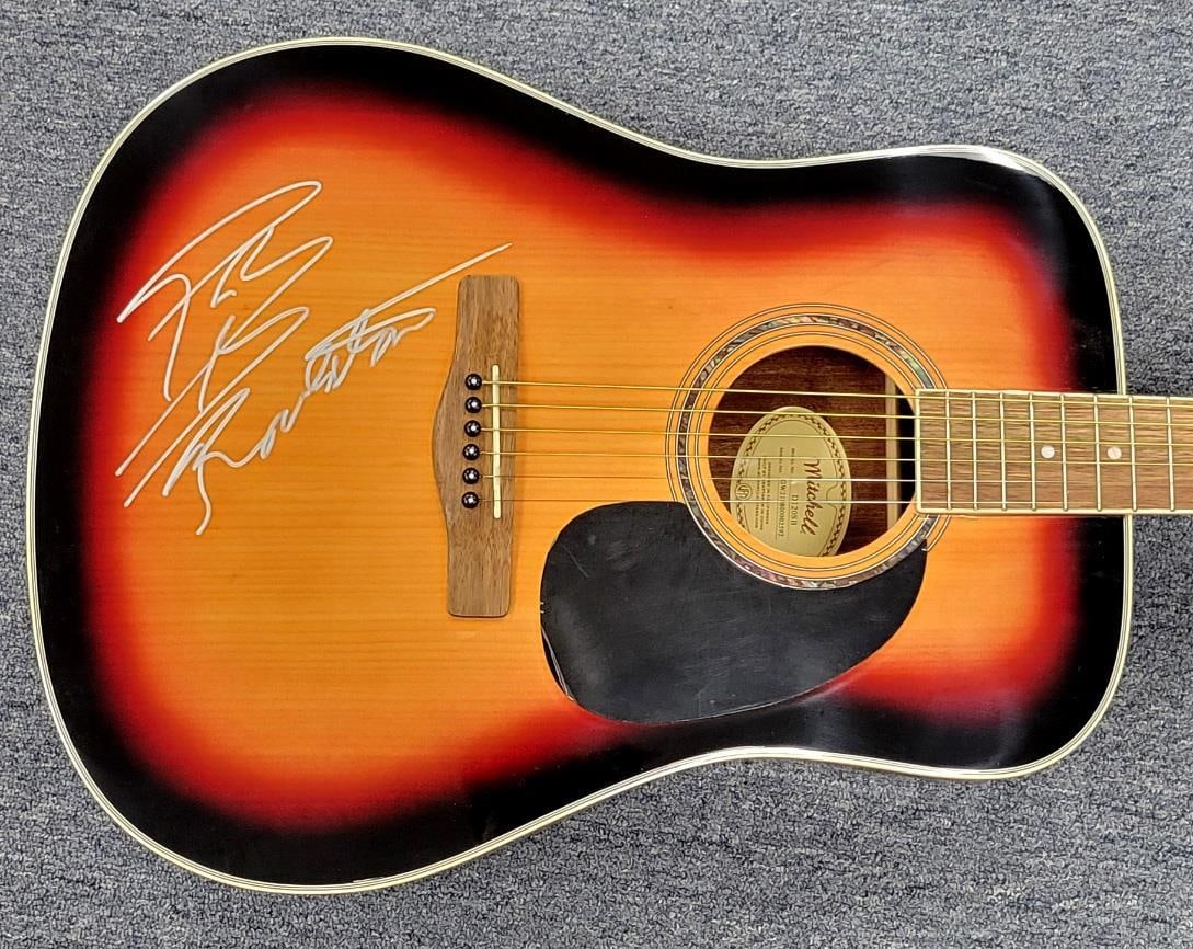 Acoustic Guitar Autographed by Post Malone with Beckett Authentication: Acoustic Guitar Autographed by Post Malone with Beckett Authentication This is a rare acoustic guitar signed by rapper Post Malone, featuring an authenticated autograph by Beckett. The guitar is an or