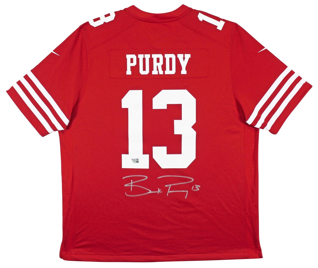 Brock Purdy Autographed Red Nike Jersey San Francisco 49ers Fanatics Certified: Brock Purdy Autographed Red Nike Jersey San Francisco 49ers Fanatics Certified Show your team spirit with this authentic signed red Nike Game Jersey featuring the name of Brock Purdy, quarterback for 