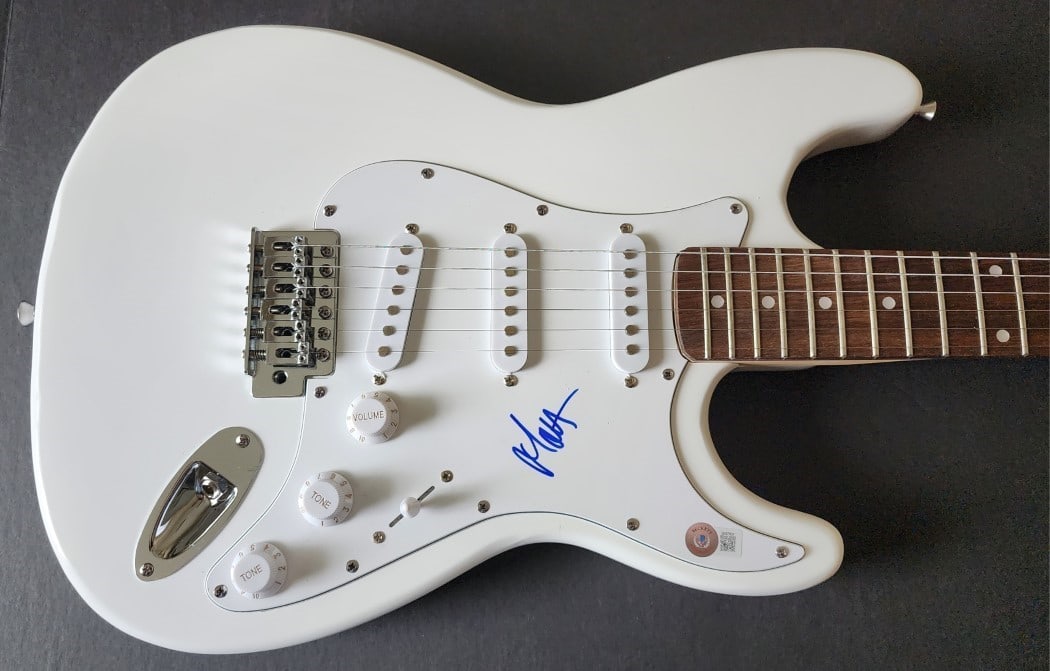 Autographed Guitar Signed by Matt Healy with Beckett Authentication: Autographed Guitar Signed by Matt Healy with Beckett Authentication This is a guitar signed by Matt Healy, the lead vocalist and songwriter. The autograph is authenticated by Beckett Authentication. T