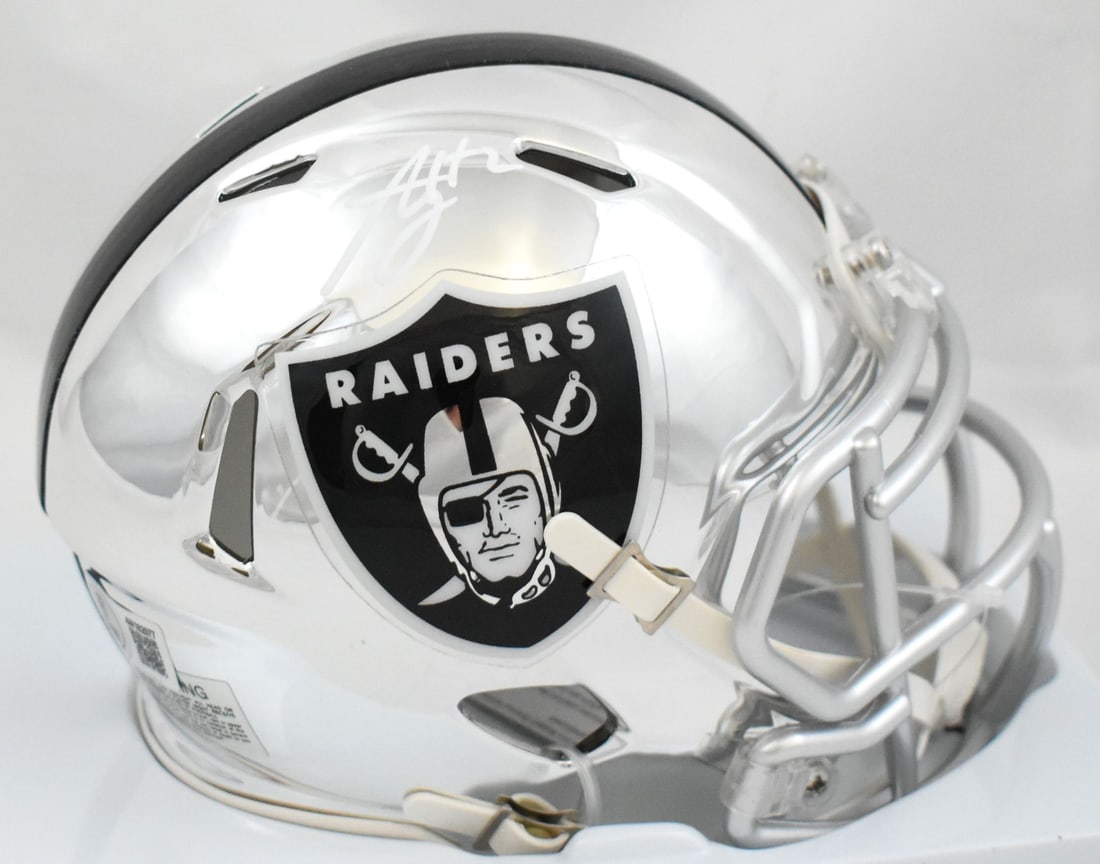 Beckett Certified Ashton Jeanty Raiders Chrome Speed Mini Helmet Signed: Beckett Certified Ashton Jeanty Raiders Chrome Speed Mini Helmet Signed This Las Vegas Raiders chrome speed mini helmet features the autograph of football player Ashton Jeanty. The signature has been 