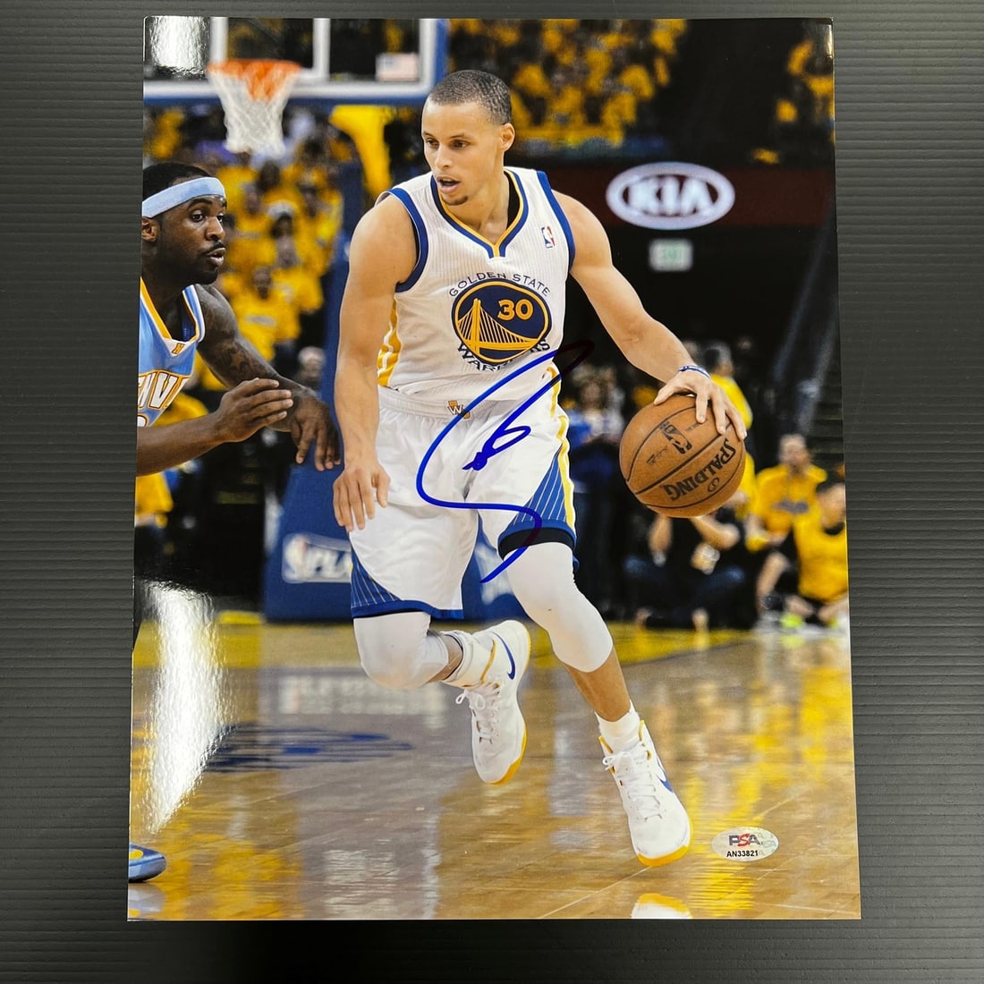Stephen Curry Signed 11x14 Photo PSA/DNA Golden State Warriors: Stephen Curry Signed 11x14 Photo PSA/DNA Golden State Warriors This professionally printed 11x14 photograph features the autograph of Stephen Curry, renowned player of the Golden State Warriors. The s