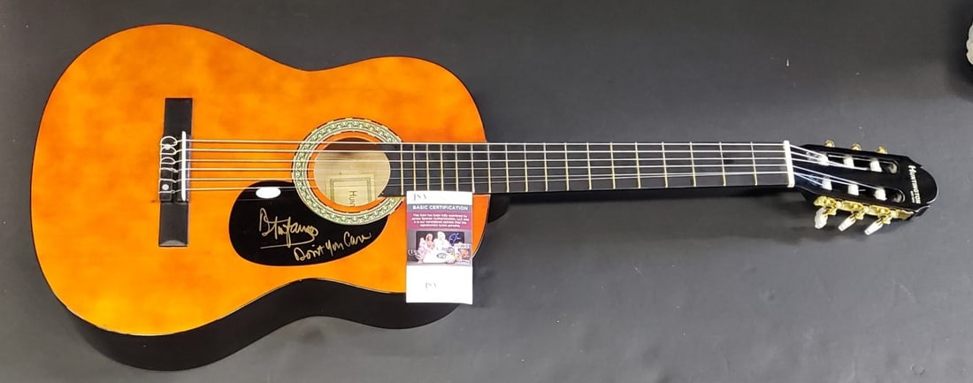 Dennis Tufano JSA Signed Acoustic Guitar with Pick: Dennis Tufano JSA Signed Acoustic Guitar with Pick This acoustic guitar has been hand signed by Dennis Tufano of The Buckinghams. The autograph has been authenticated by James Spence Authentication (J