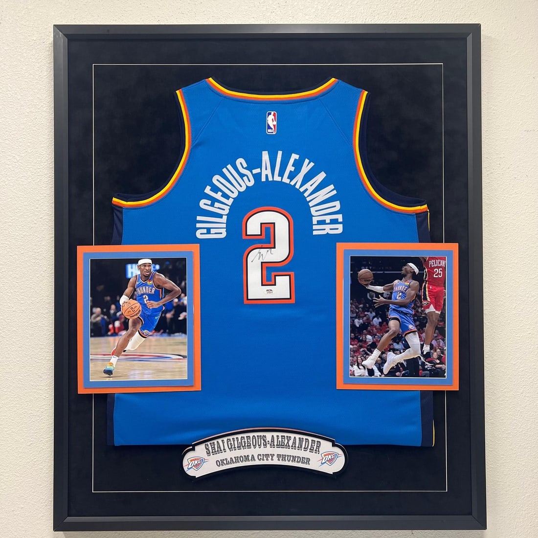 Framed Oklahoma City Thunder jersey signed by Shai Gilgeous-Alexander PSA authenticated: Framed Oklahoma City Thunder jersey signed by Shai Gilgeous-Alexander PSA authenticated This framed Oklahoma City Thunder jersey features the autograph of Shai Gilgeous-Alexander. The signature has be