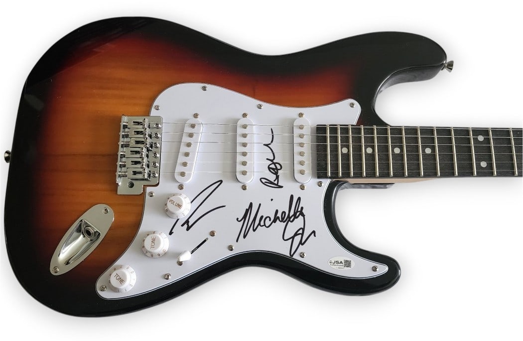 Autographed Guitar Featuring Cannons Band Signed by Davis Joy Clapman JSA Certified: Autographed Guitar Featuring Cannons Band Signed by Davis Joy Clapman JSA Certified This autographed guitar and guitar pick set features signatures from the band Cannons, including Paul Davis, Michell