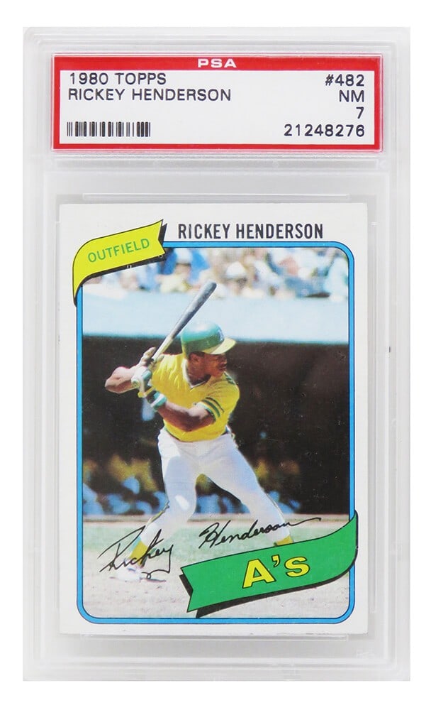 Rickey Henderson 1980 Topps Baseball #482 Rookie Card PSA 7 NM: Rickey Henderson 1980 Topps Baseball #482 Rookie Card PSA 7 NM This listing features a 1980 Topps Baseball #482 rookie card of Hall of Famer Rickey Henderson, encapsulated and graded Near Mint (NM) 7 