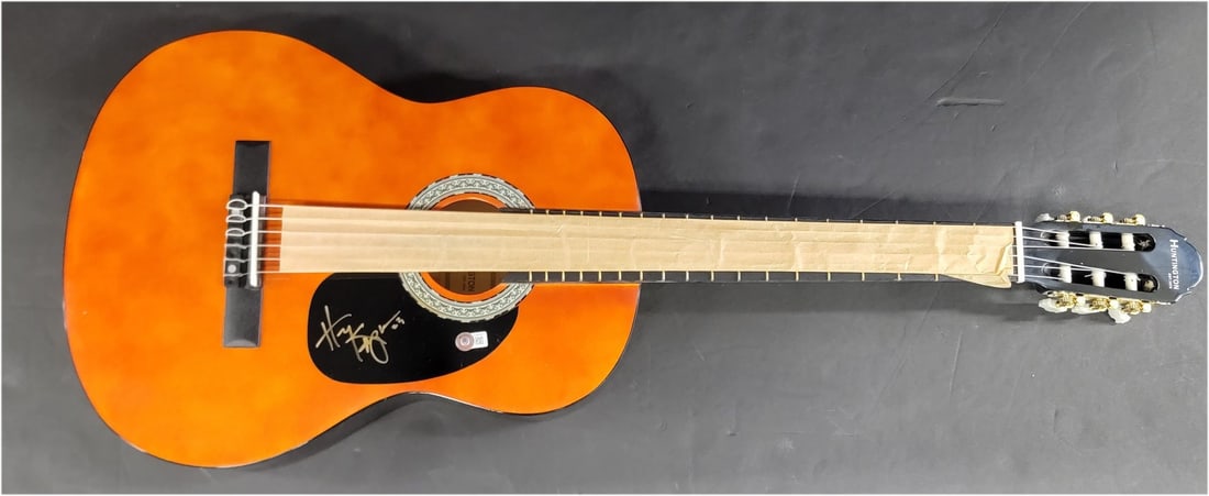 Henry Kapono Signed Acoustic Guitar with Beckett Authentication: Henry Kapono Signed Acoustic Guitar with Beckett Authentication This is an authentic acoustic guitar signed by Henry Kapono, complete with Beckett Autograph Authentication for guaranteed legitimacy. T