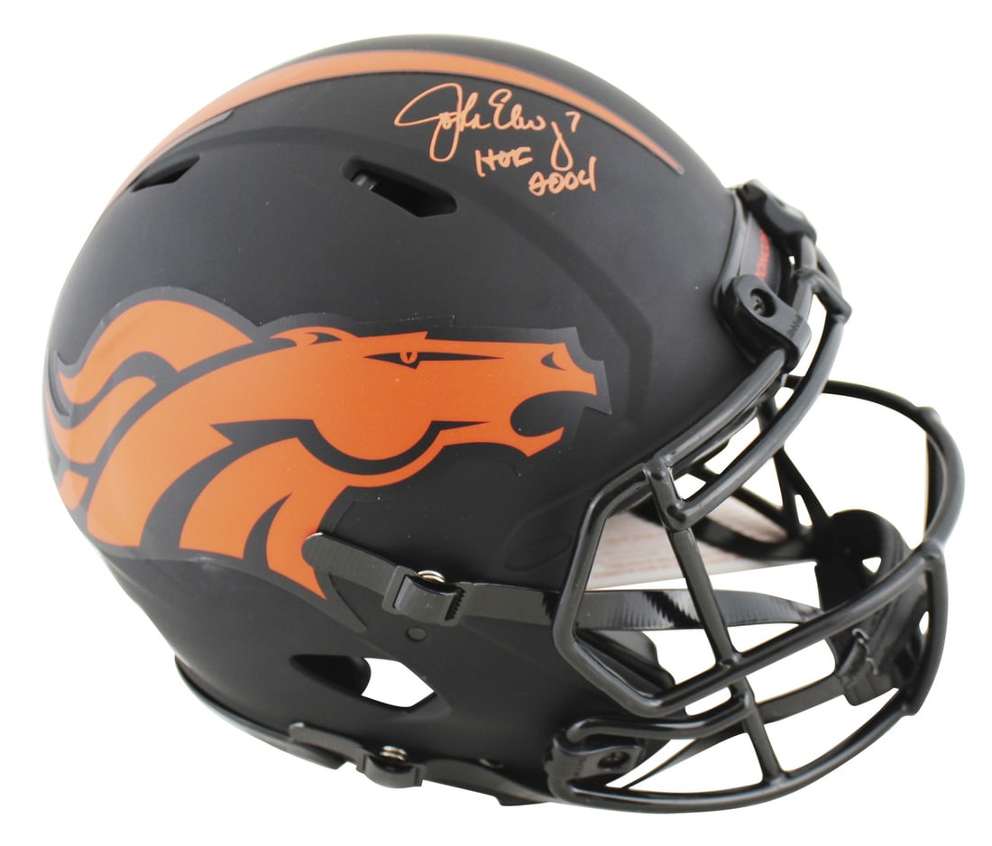 John Elway Signed Denver Broncos Eclipse Helmet HOF 04 BAS Witnessed: John Elway Signed Denver Broncos Eclipse Helmet HOF 04 BAS Witnessed This Denver Broncos Eclipse Proline Full Size Speed Helmet is a remarkable collectible, personally signed by NFL legend John Elway 