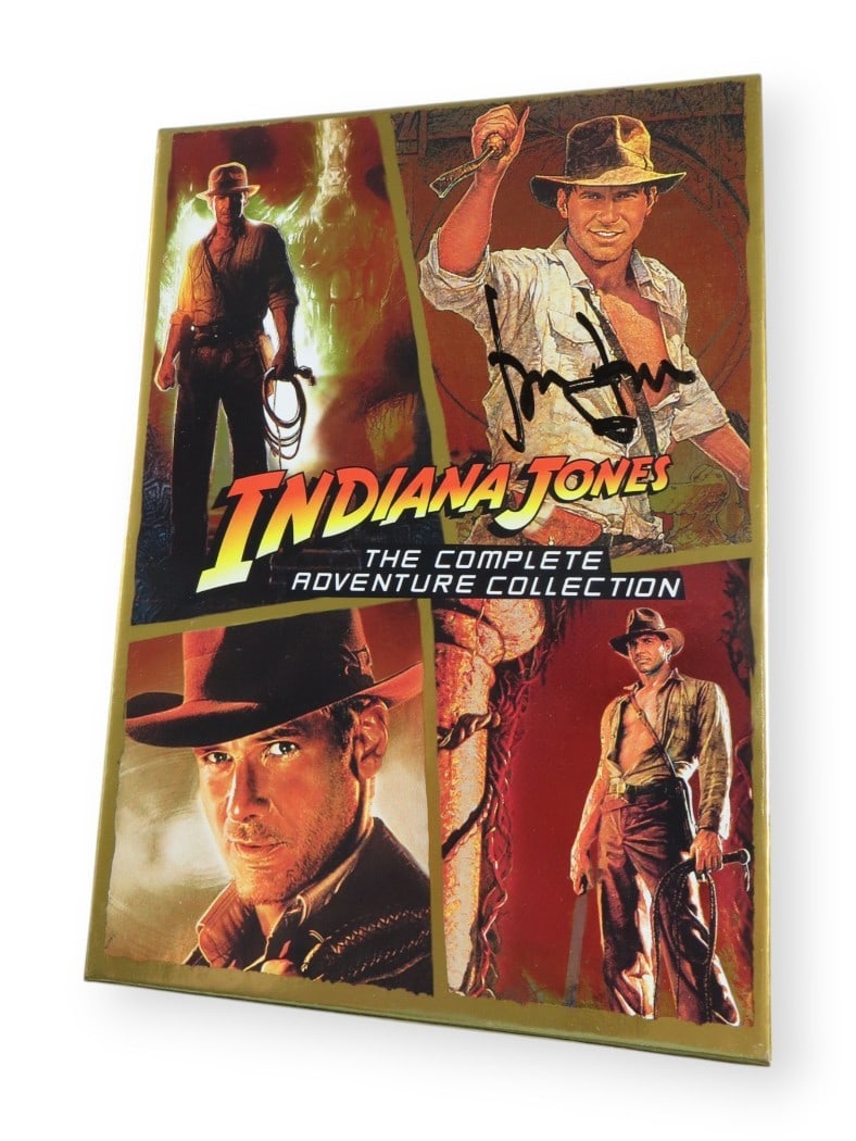 Harrison Ford Autographed DVD Cover Indiana Jones BAS Authenticated: Harrison Ford Autographed DVD Cover Indiana Jones BAS Authenticated This original DVD cover from the Indiana Jones Collection features the autograph of the legendary Harrison Ford, authenticated by Be