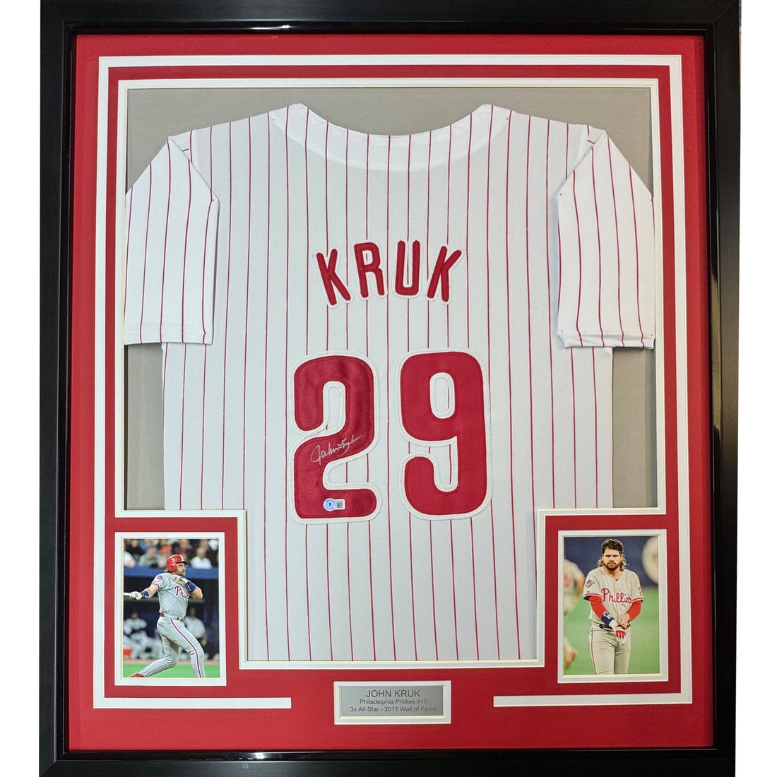 Framed John Kruk Autographed Jersey Philadelphia Phillies JSA COA 33x42: Framed John Kruk Autographed Jersey Philadelphia Phillies JSA COA 33x42 Celebrate the legacy of John Kruk with this stunning framed autographed Philadelphia Phillies pinstripe jersey. Measuring 33"x42