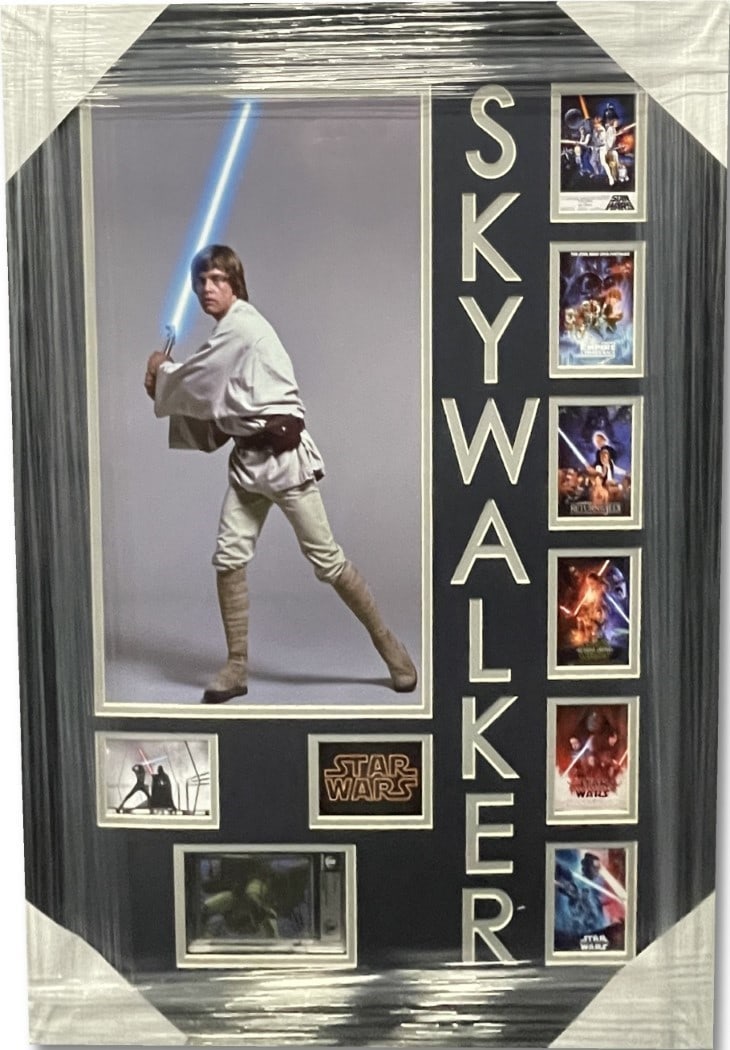 Framed Mark Hamill Signed Star Wars Card Authenticated by JSA 22x31: Framed Mark Hamill Signed Star Wars Card Authenticated by JSA 22x31 This custom framed display features an autographed card signed by Mark Hamill, known for his iconic role as Luke Skywalker in Star W