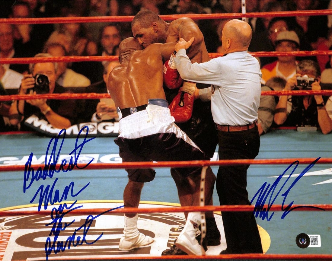Mike Tyson autographed 11x14 boxing photo Baddest Man On The Planet BAS: Mike Tyson autographed 11x14 boxing photo Baddest Man On The Planet BAS This 11x14 photograph features legendary boxer Mike Tyson and is hand-signed with the inscription "Baddest Man On The Planet." T