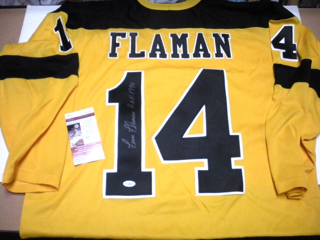 Signed Boston Bruins CCM official licensed jersey by Fern Flaman JSA COA: Signed Boston Bruins CCM official licensed jersey by Fern Flaman JSA COA This is a pre-owned, officially licensed CCM Boston Bruins jersey signed by Fern Flaman. The jersey is an original item, not a 