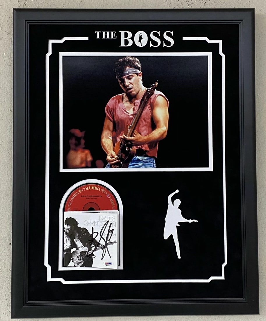 Bruce Springsteen Signed CD Cover Custom Framed PSA/DNA LOA 21x27: Bruce Springsteen Signed CD Cover Custom Framed PSA/DNA LOA 21x27 This stunning custom framed and matted CD cover features the iconic autograph of Bruce Springsteen, known as The Boss. Measuring 21x27
